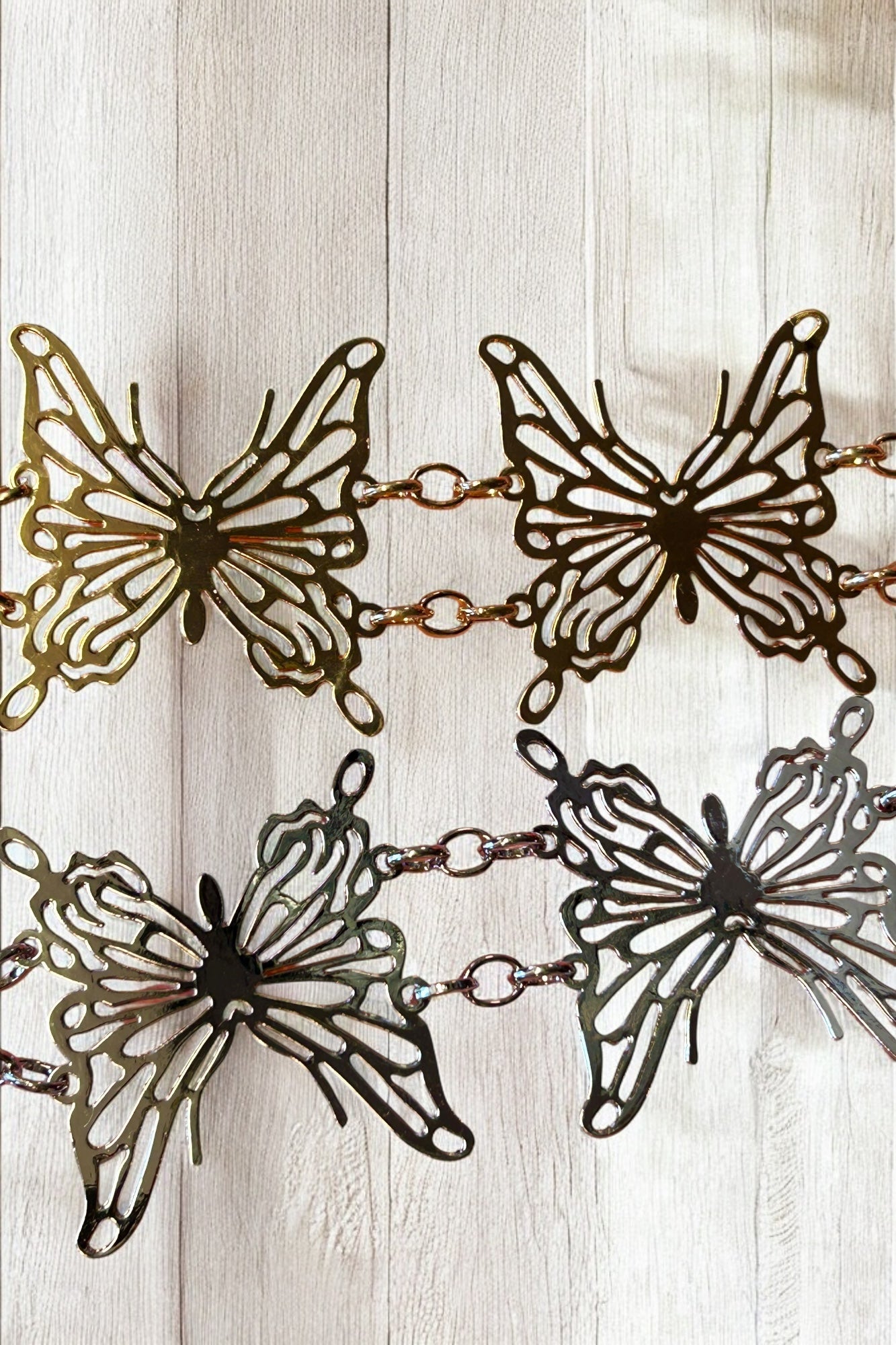 LASER CUTOUT BUTTERFLY CHAIN BELT