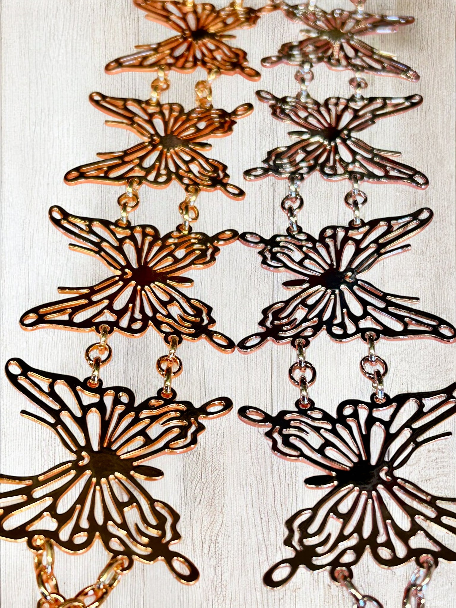 LASER CUTOUT BUTTERFLY CHAIN BELT