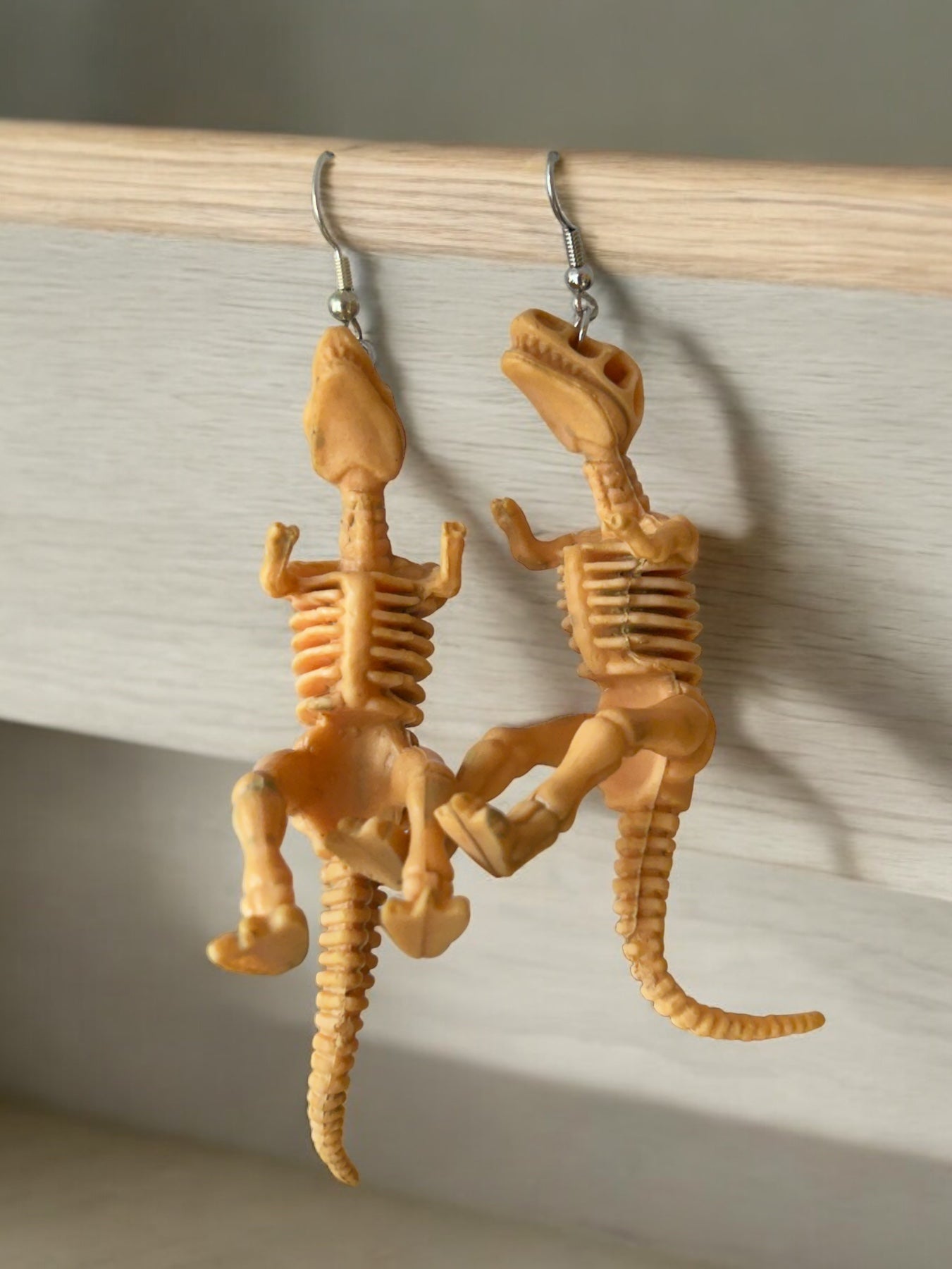 Hopping 3-D T-Rex Skeleton Earrings